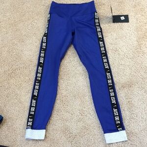 NWT! NIKE Size XS blue mid rise sports tights